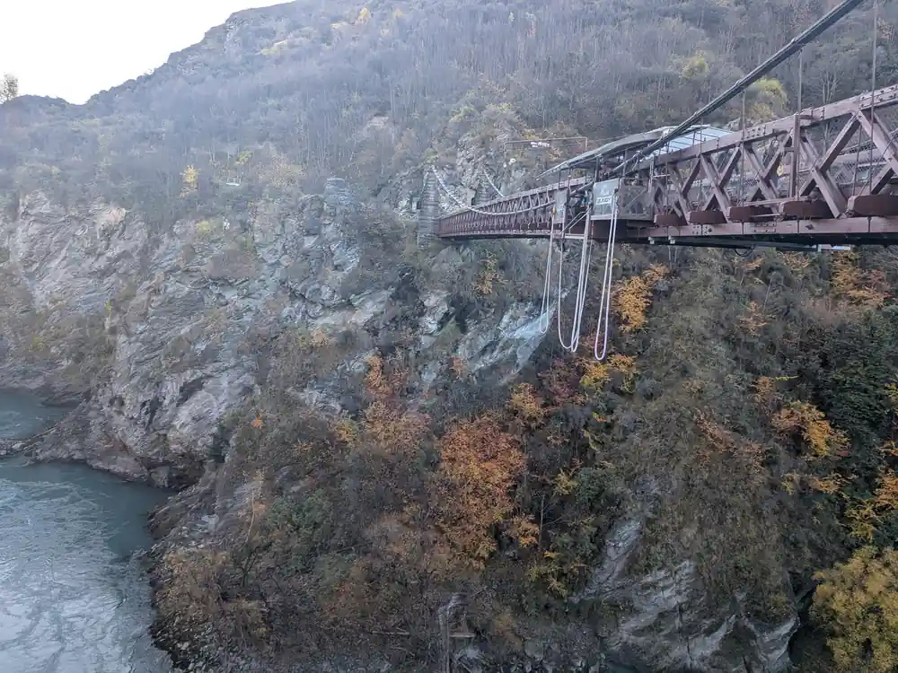 The bridge across the gorge in autumn, seen from the far bank