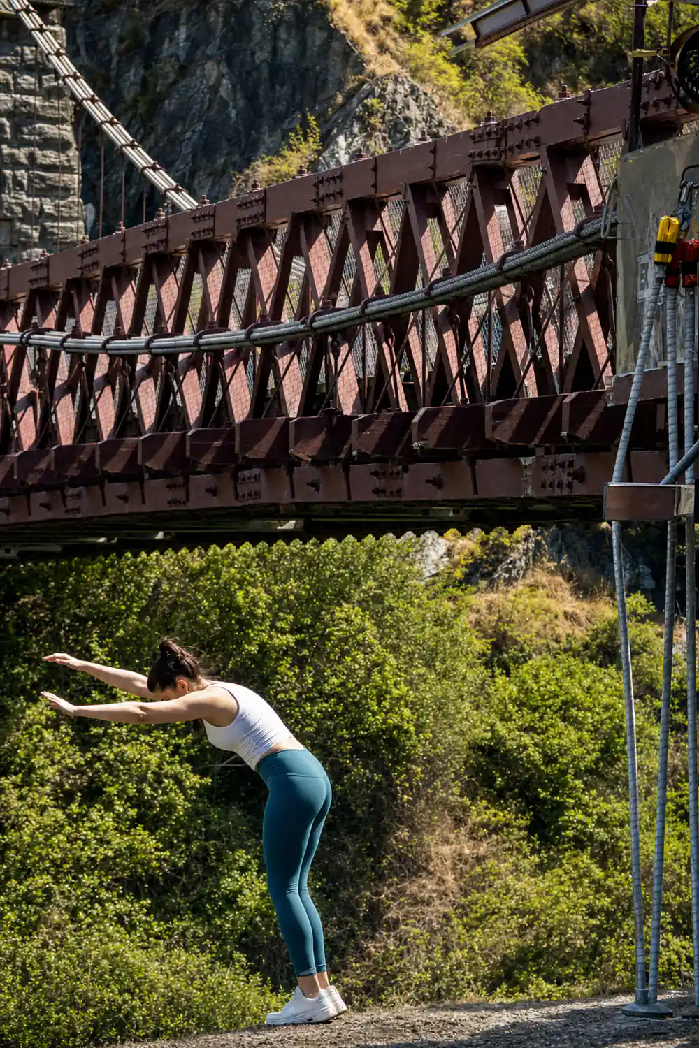 The underside of the bridge truss with the gorge below